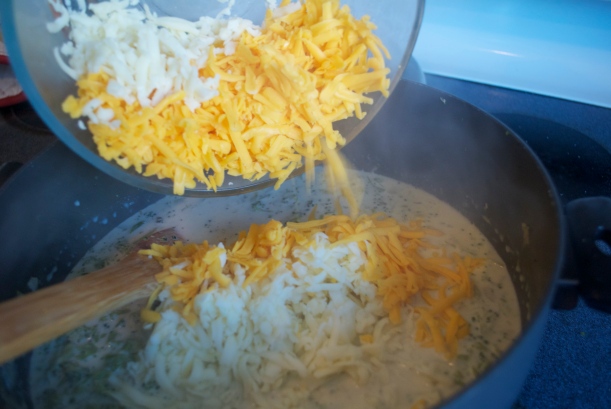 Adding in the cheese