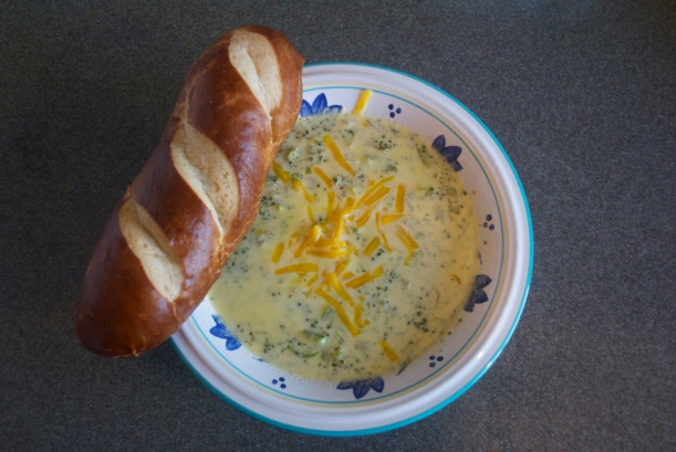 Cheesy Broccoli Soup with soft pretzel